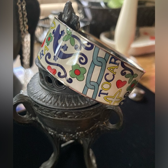 Colorful Enamel Bracelet Vibrant floral & geometric patterns. Features branding. - Picture 2 of 14